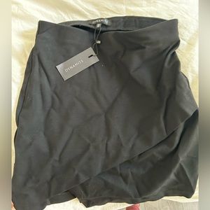 DYNAMITE MINI ASYMMETRICAL SKIRT